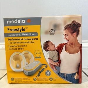Medela Freestyle Double Breast Pump in Yellow and Gray Packaging